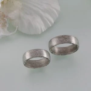 Spiegelbildliche Mokume Gane Ringe